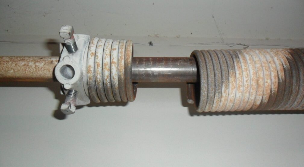 Garage door spring repair service.