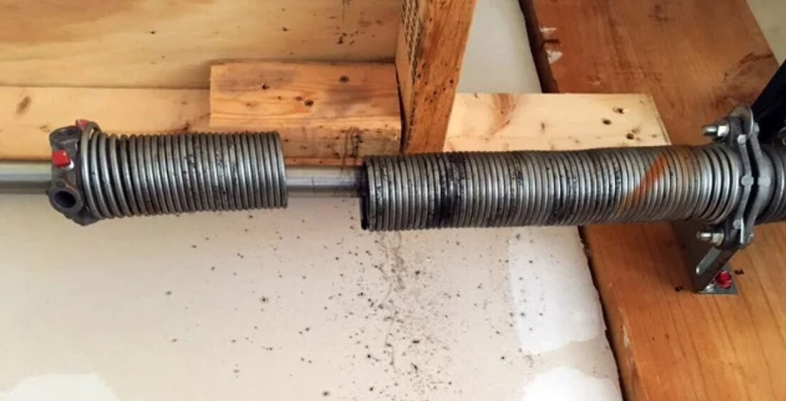 Garage door spring repair service.