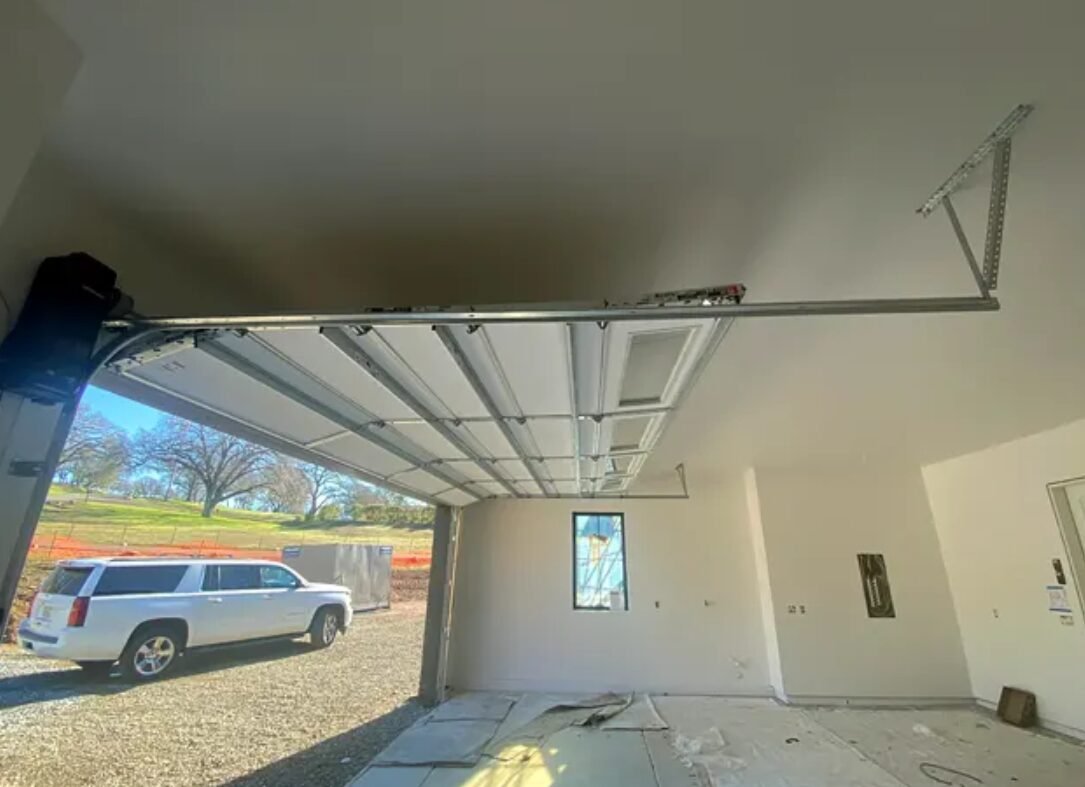 Off-Track Garage Door Realignment